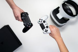 Free Person Holding White and Black Xbox One Game Controller Stock Photo